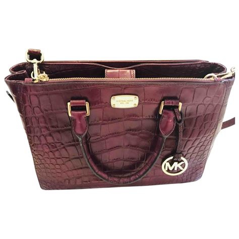 michael kors little burgundy|Michael Kors handbags.